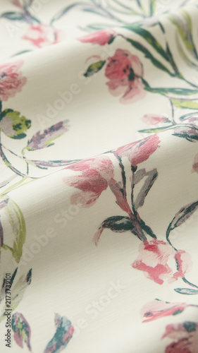 Creased fabric surface featuring pink botanical print and watercolor floral design material watercolor artistic illustration botanical interior
