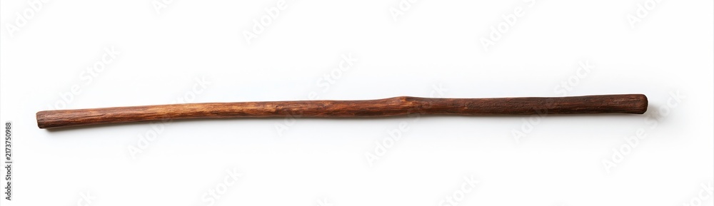 Naklejka premium Single rustic wooden stick lying horizontally on white