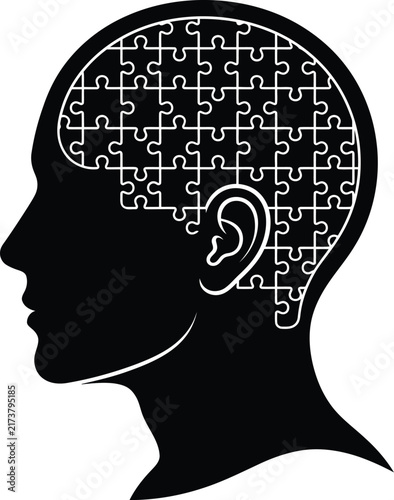Human head profile silhouette featuring intricate jigsaw puzzle pieces representing mental health and cognitive logic processes