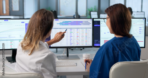 Canvastavla Woman In Medical Uniform Analyzes Patient Enrollment Data