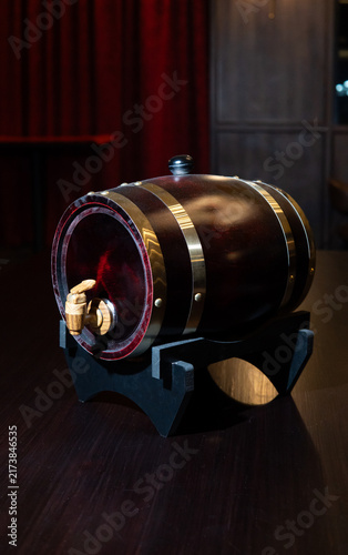 Obraz na płótnie Wooden Barrel with Brass Hoops on Dark Background.