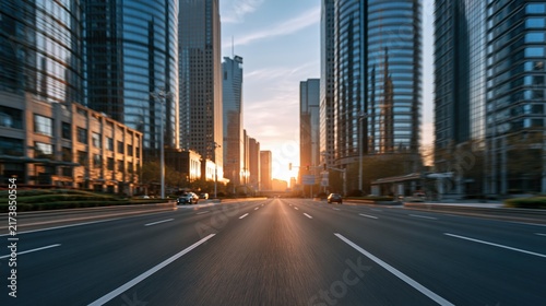 Sunset glow on empty city avenue with modern