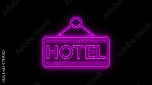 Hotel neon sign glowing with purple light on black background in motion.