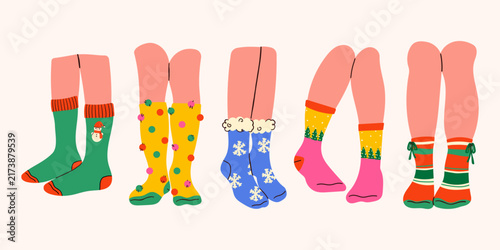 Set of cozy Christmas and winter socks, featuring playful designs like Christmas trees. Premium winter stock with vibrant holiday colors, perfect for a cheerful seasonal vibe.