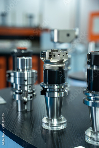 Multiple precision machining tool holders placed on a worktable