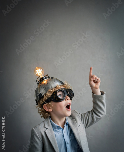 Young Scientist Pointing Up with Creative Idea