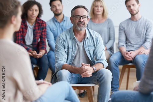 Counseling session with therapist and group