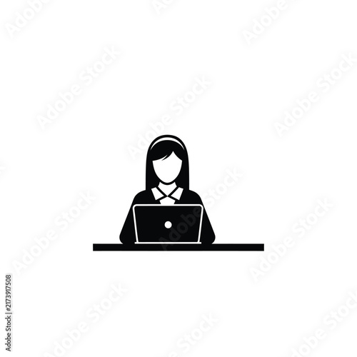 Woman Working on Laptop Computer at Desk Icon.