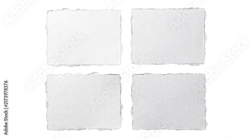 Fotografie Set of four textured white handmade paper sheets with deckle edges arranged in a 2x2 grid