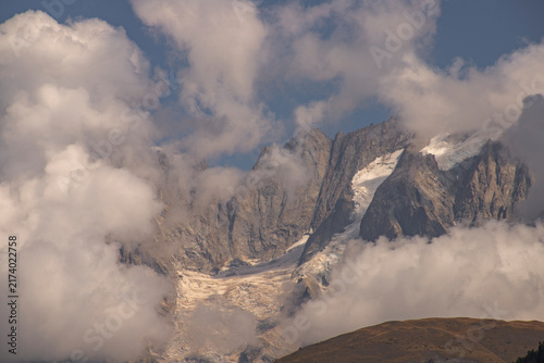 Mont blanc peak revealing through thick clouds