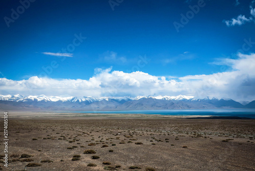Obraz na plátně Scenic road view of Lake Karakul near Tajik-Chinese border, Pamir Highway Tajiki