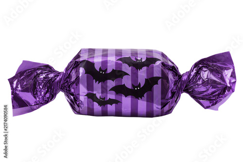 Halloween sweet candy isolated PNG, purple foil wrapped treat on transparent background, trick or treat snack
