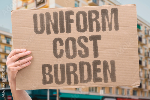 Bild auf Leinwand "Uniform cost burden" Buying school uniforms strains low-income families