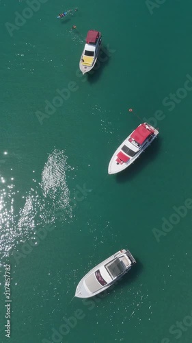 Aerial of view of a yachts in the middle of turquoise sea by summer	
