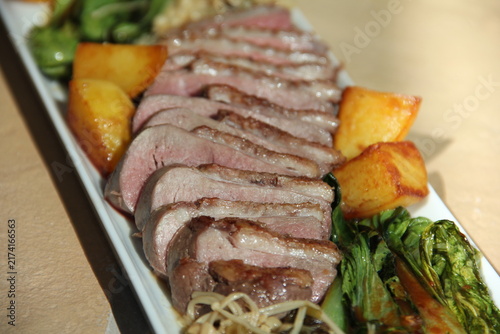 фотографія Iberico duck breast with pak choi enoki mushrooms and potatoes