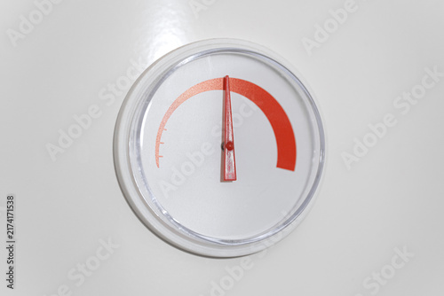 Quadro su tela Close up of temperature gauge dial indicator on water heater boiler system isolated on white background