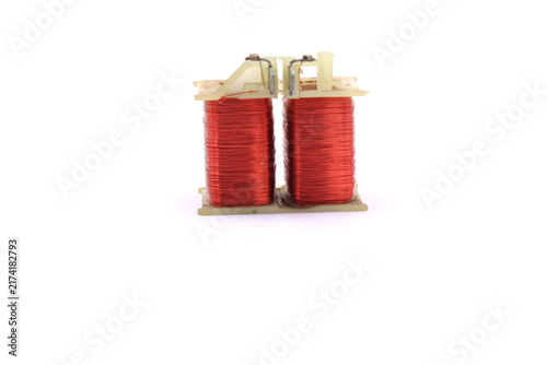 Obraz na plátně A red replacement coil for a motor on a white background.