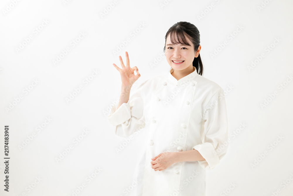 Fototapeta premium コックコートを着た女性