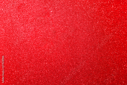 Red glitter paper texture background with space. glitter star effect just like space. night sky universe rusty texture rough grain.