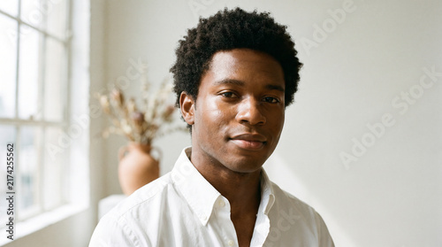 African American Man Wearing Crisp White Shirt for Minimalist Editorial