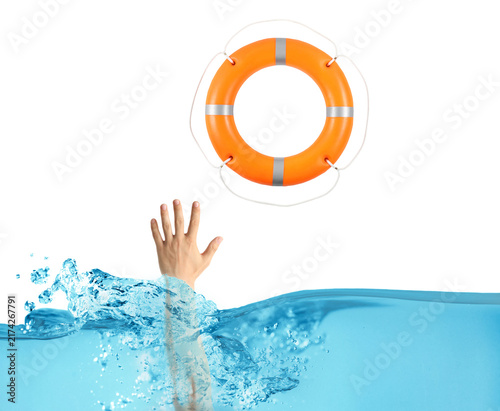 Foto Man drowning in water trying to catch lifebuoy, closeup
