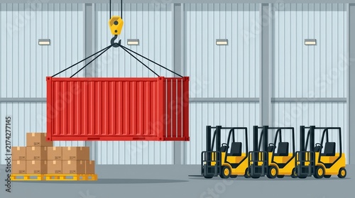 Industrial warehouse scene with a red shipping container being lifted by a crane hook.