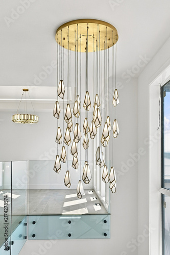 Sophisticated brass ceiling fixture with hanging crystal droplets