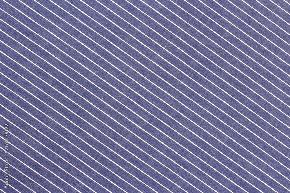 Fototapeta premium Striped fabric close up showing a pattern of blue and white lines