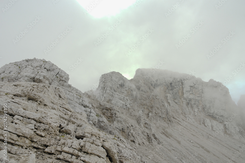 Fototapeta premium Rocks and cliffs on the northern side of the Pizzo Arera, a mountaineering destination in the Orobie Prealps. Province of Bergamo, Lombardy, Italy.