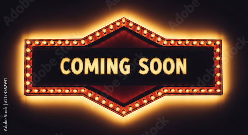Vintage marquee sign with coming soon text, illuminated retro theater billboard, glowing cinema light box on dark background