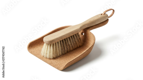 Wooden dustpan and brush set for cleaning.