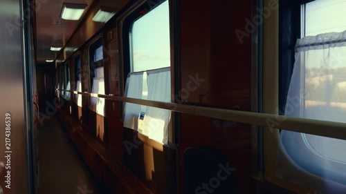 Empty corridor of a vintage train traveling