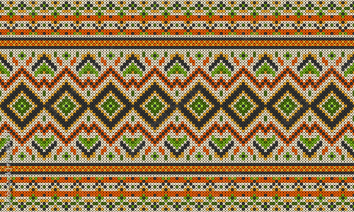 Colorful geometric cross stitch pattern with green orange yellow and black ethnic textile design.