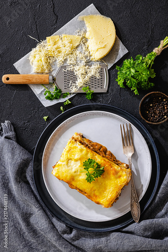Baked lasagna square with beef, sauce, cheese