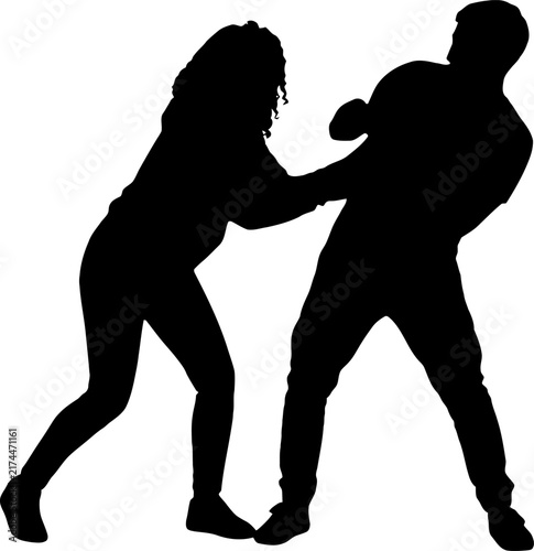 Foto Two silhouettes fighting in a defensive stance