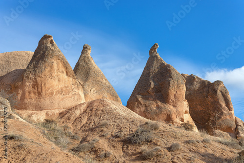 Unique rock formations and fairy chimneys in the volcanic landscape of Cappadocia, Türkiye.