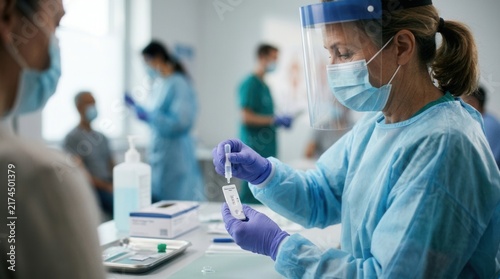 Medical Professional Conducts Rapid Diagnostic Test in Clinical Setting