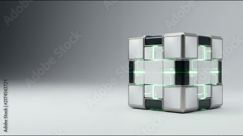 Complex digital puzzle cube with white and black panels featuring glowing green circuit board lines