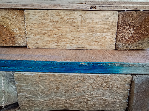 Принти на полотні Close up texture of rustic stacked wooden planks with blue painted edge line bac