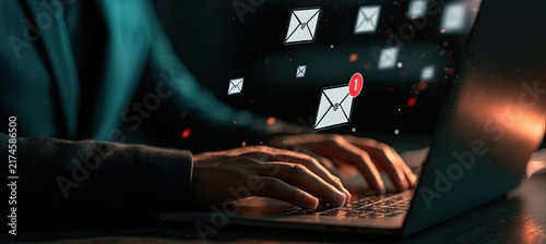 Person typing on laptop with email icons floating around, representing digital communication and online messaging.