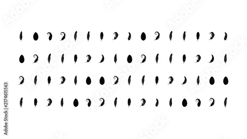 A collection of various black feather silhouettes and oval shapes arranged in rows isolated on a clean white background