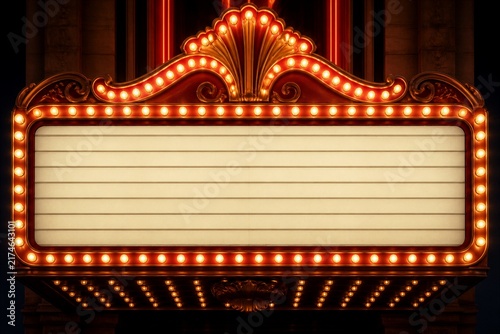 Vintage theater marquee lit with rows of glowing bulbs