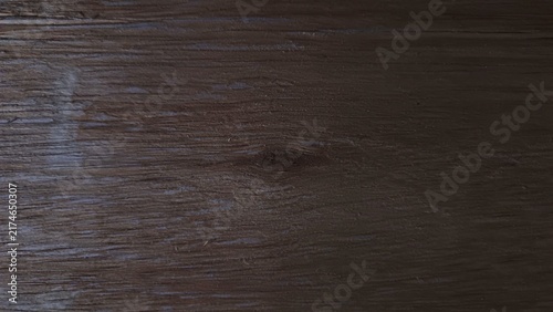 Obraz na plátně Cinematic close-up of natural wood texture showing detailed grain patterns and a