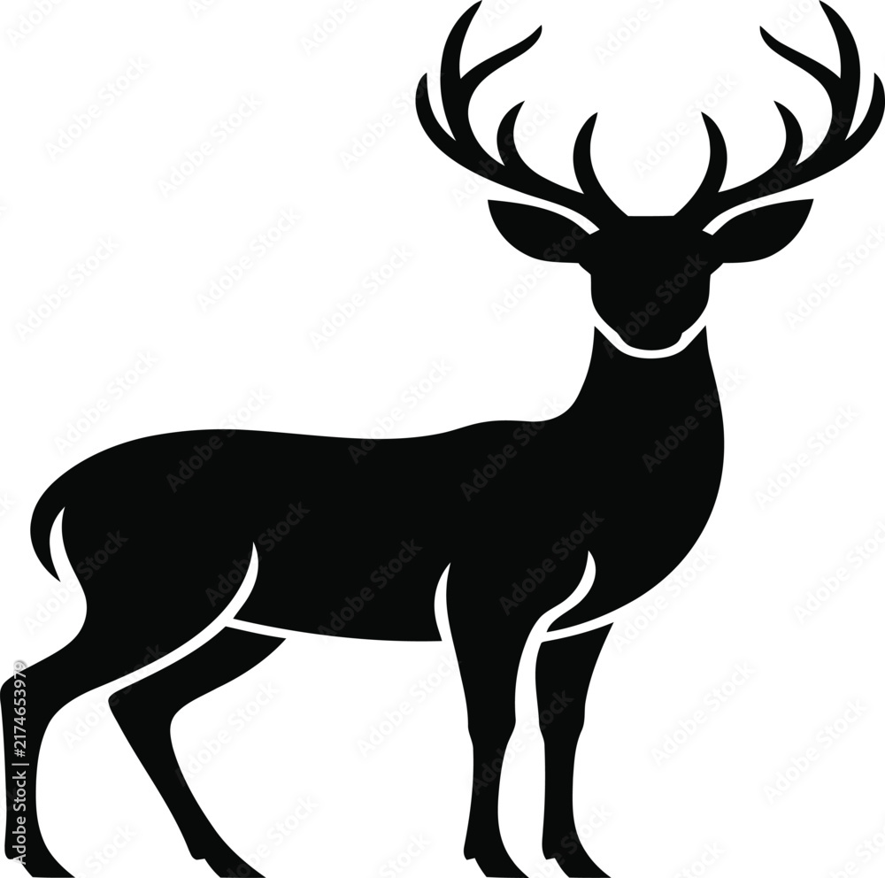 Fototapeta premium Stag stands with majestic antlers in a sharp graphic silhouette that represents the strength and natural beauty of wildlife in the wilderness.