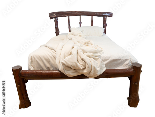 Foto Brown wooden bed with white untidy or messy bedclothes isolated with clipping pa