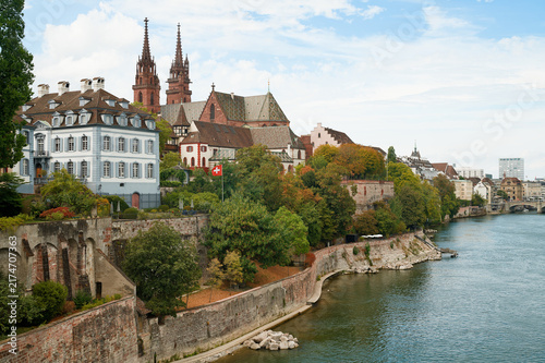 Bild auf Leinwand Panoramic View of Basel Minster Cathedral and Historic Old Town Waterfront Along