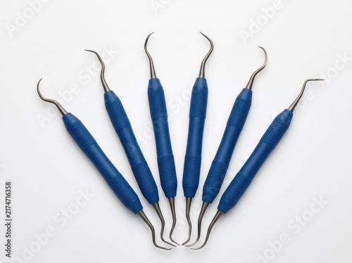 Set of Dental Examination Instruments with Blue Handles.