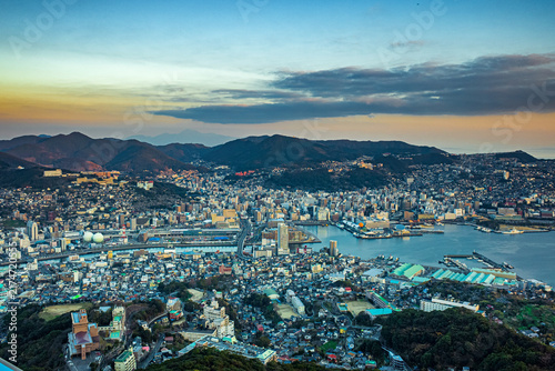 Bild auf Leinwand Panoramic View of Nagasaki Harbor and City at Dusk