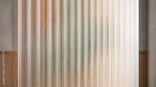 Translucent Ribbed Architectural Panel in Minimal Interior
