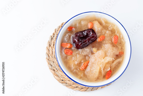 Obraz na płótnie Chinese Pear Dessert Soup with Red Dates in Porcelain Bowl